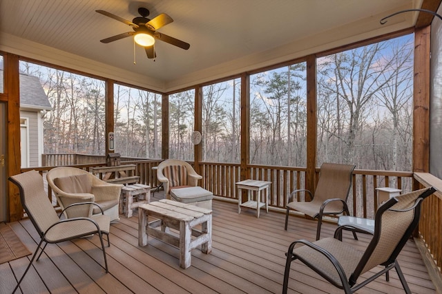 sunroom / solarium with ceiling fan