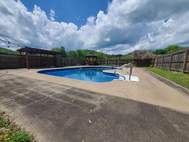 188 Bradford Hill Rd N, Brush Creek, TN 38547 - view of swimming pool with a patio, a gazebo, a fenced in pool, and a fenced backyard