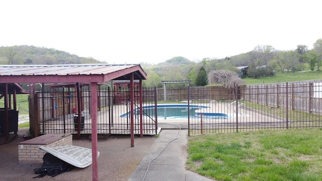 188 Bradford Hill Rd N, Brush Creek, TN 38547 - view of swimming pool featuring fence, a patio area, and a fenced in pool