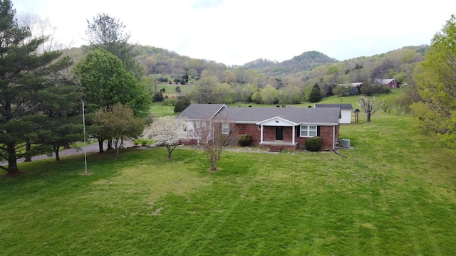 188 Bradford Hill Rd N, Brush Creek, TN 38547 - ranch-style home featuring brick siding and a front yard