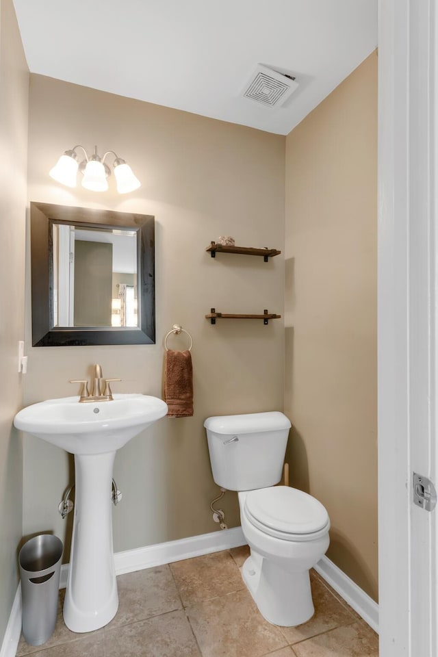 1244 Baker Creek Dr, Spring Hill, TN 37174 - half bathroom with visible vents, baseboards, tile patterned flooring, and toilet