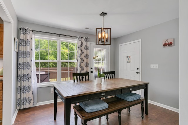 1244 Baker Creek Dr, Spring Hill, TN 37174 - dining room with an inviting chandelier, baseboards, wood finished floors, and visible vents