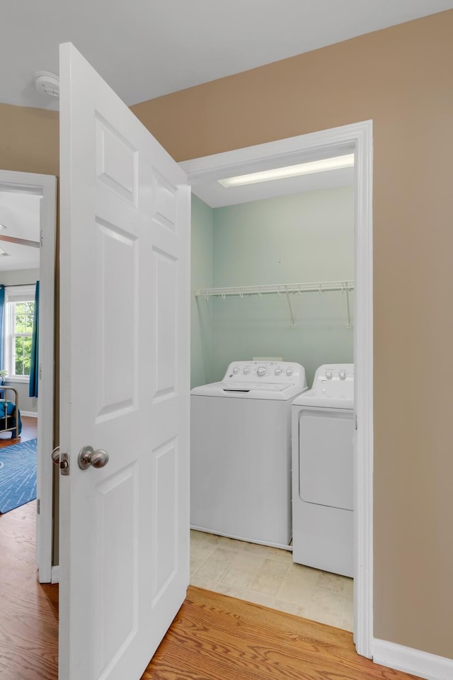 1244 Baker Creek Dr, Spring Hill, TN 37174 - clothes washing area featuring washing machine and clothes dryer and laundry area