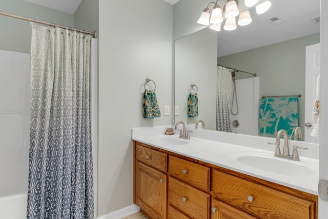1244 Baker Creek Dr, Spring Hill, TN 37174 - full bathroom featuring visible vents, a sink, and double vanity