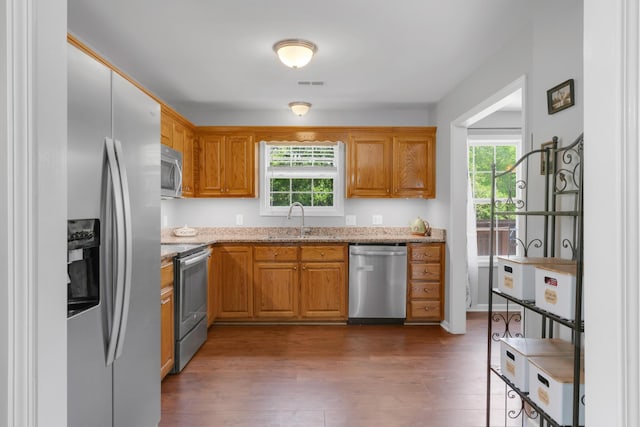 1244 Baker Creek Dr, Spring Hill, TN 37174 - kitchen featuring visible vents, a sink, appliances with stainless steel finishes, and a wealth of natural light