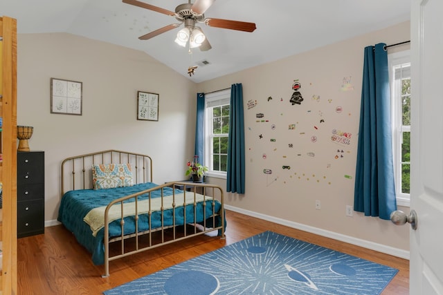 1244 Baker Creek Dr, Spring Hill, TN 37174 - bedroom featuring wood finished floors, ceiling fan, lofted ceiling, and visible vents