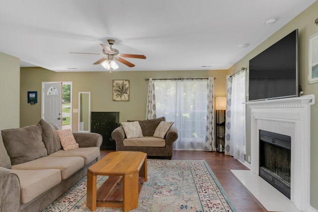 1244 Baker Creek Dr, Spring Hill, TN 37174 - living room featuring a ceiling fan, a fireplace with flush hearth, and wood finished floors