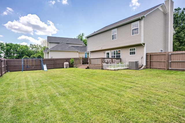 1244 Baker Creek Dr, Spring Hill, TN 37174 - rear view of property with a yard, central AC, a chimney, and a fenced backyard