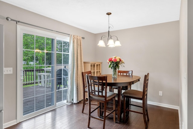 846 Todd Ave, Lewisburg, TN 37091 - dining room with baseboards, a notable chandelier, and hardwood / wood-style flooring