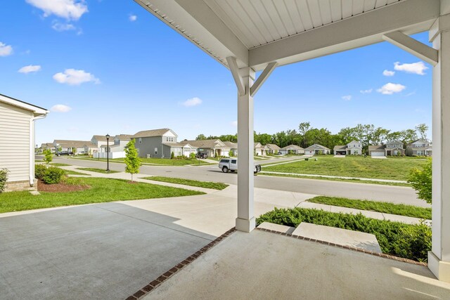 view of patio with a residential view
