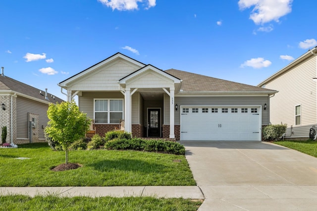 view of front of property featuring covered porch, a front yard, brick siding, concrete driveway, and an attached garage