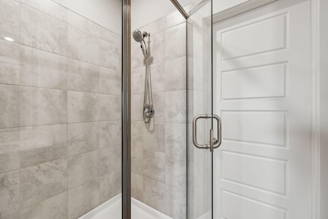 full bathroom with a shower stall