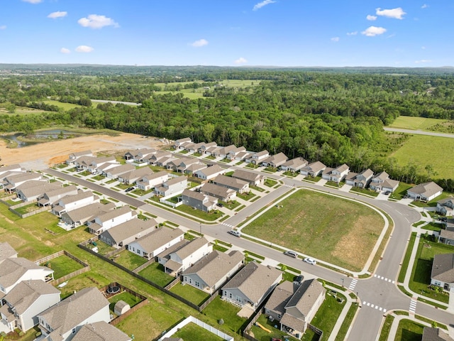 aerial view with a forest view and a residential view