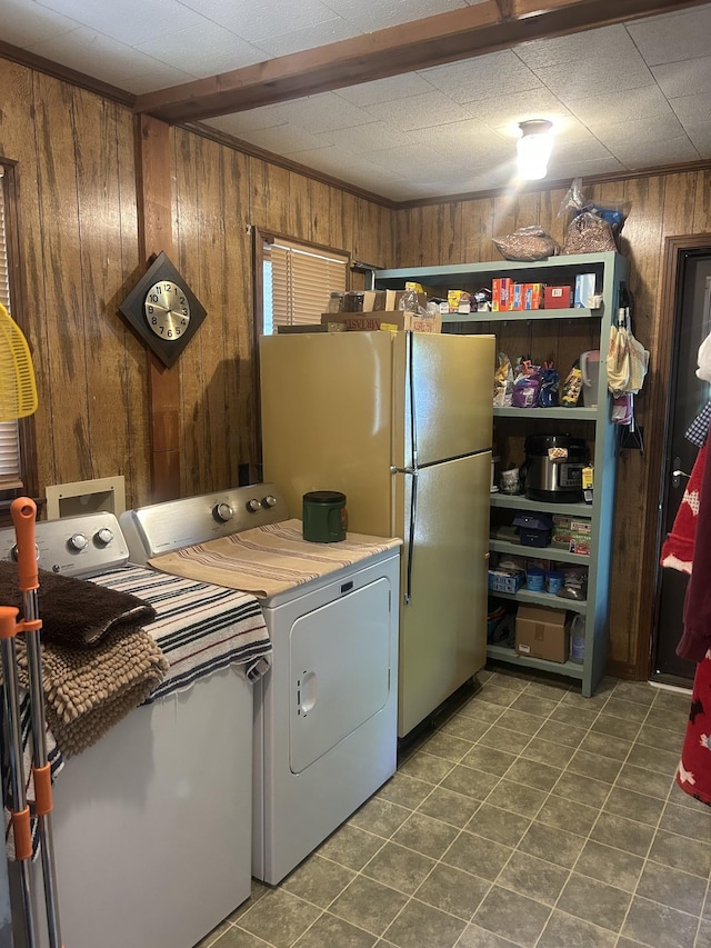 laundry room with washer / dryer, tile patterned flooring, laundry area, and wooden walls