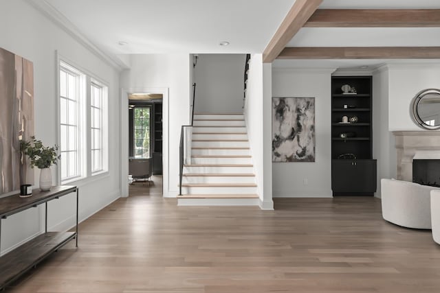 1105 Brookmeade Dr, Nashville, TN 37204 - stairway with baseboards, wood finished floors, and a fireplace