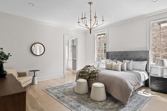 1105 Brookmeade Dr, Nashville, TN 37204 - bedroom featuring an inviting chandelier, ornamental molding, multiple windows, and light wood-type flooring