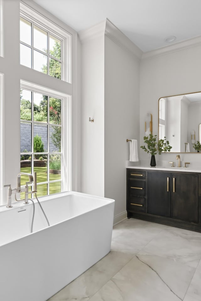 1105 Brookmeade Dr, Nashville, TN 37204 - full bathroom with ornamental molding, a soaking tub, marble finish floor, and vanity