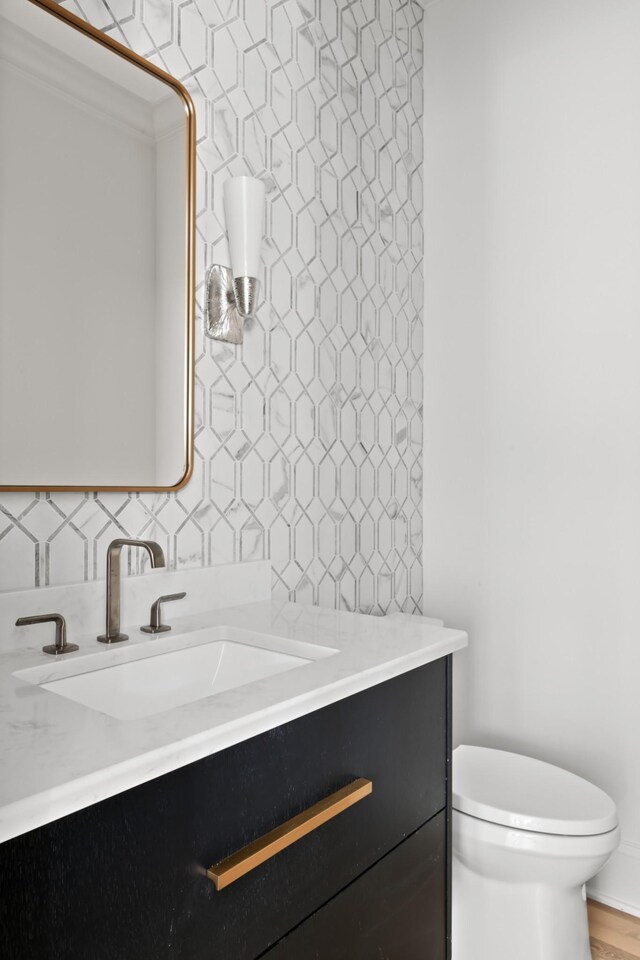 1105 Brookmeade Dr, Nashville, TN 37204 - bathroom with toilet, tasteful backsplash, and vanity