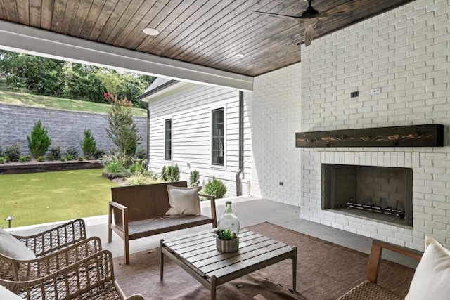 1105 Brookmeade Dr, Nashville, TN 37204 - view of patio featuring ceiling fan and an outdoor living space with a fireplace