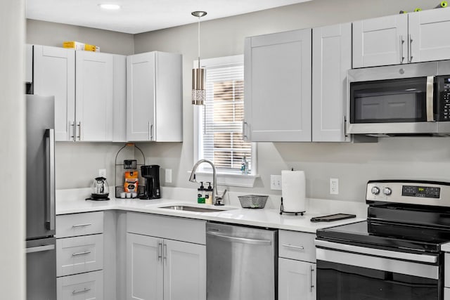 2821 Old Matthews Rd, Nashville, TN 37207 - kitchen with light countertops, stainless steel appliances, recessed lighting, and a sink