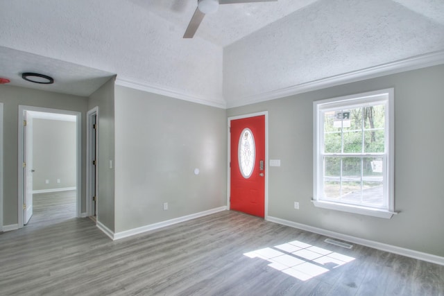 2821 Old Matthews Rd, Nashville, TN 37207 - foyer entrance featuring baseboards, ceiling fan, a textured ceiling, and wood finished floors