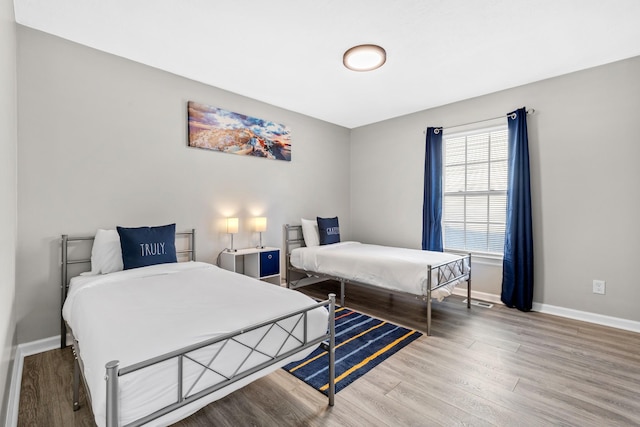 2821 Old Matthews Rd, Nashville, TN 37207 - bedroom with baseboards and wood finished floors