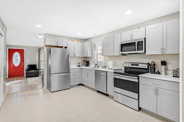 2821 Old Matthews Rd, Nashville, TN 37207 - kitchen featuring a sink, appliances with stainless steel finishes, recessed lighting, and light countertops