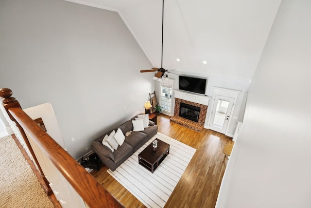 1353 Stewart Creek Rd, Murfreesboro, TN 37129 - living area with high vaulted ceiling, a fireplace, ceiling fan, wood finished floors, and ornamental molding