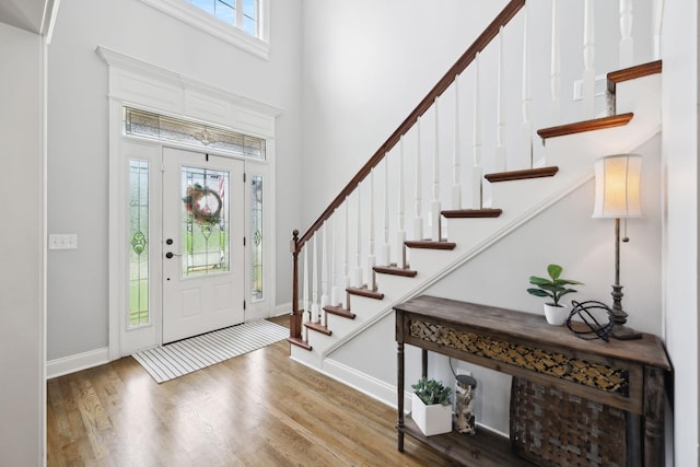 1353 Stewart Creek Rd, Murfreesboro, TN 37129 - foyer featuring a high ceiling, wood finished floors, stairway, and baseboards