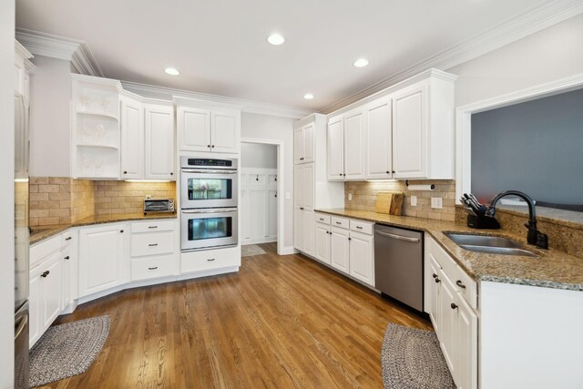 1353 Stewart Creek Rd, Murfreesboro, TN 37129 - kitchen featuring stainless steel appliances, a sink, ornamental molding, open shelves, and white cabinets