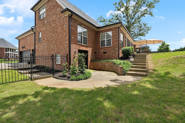1353 Stewart Creek Rd, Murfreesboro, TN 37129 - view of side of home featuring brick siding, stairs, and a gate