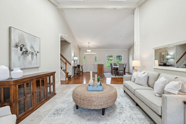 1403 Sneed Rd W, Franklin, TN 37069 - living room featuring stairs, high vaulted ceiling, ornamental molding, and beamed ceiling