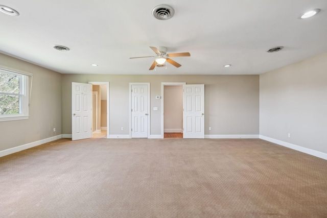 1403 Sneed Rd W, Franklin, TN 37069 - unfurnished bedroom with baseboards, light colored carpet, and visible vents