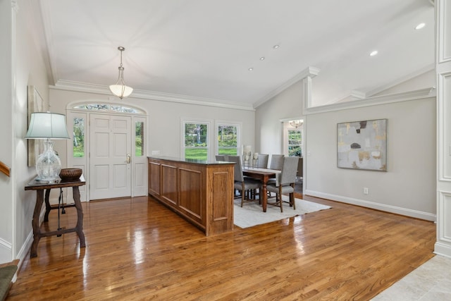 1403 Sneed Rd W, Franklin, TN 37069 - entryway with crown molding, baseboards, wood finished floors, and lofted ceiling