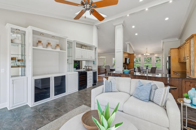1403 Sneed Rd W, Franklin, TN 37069 - living room featuring crown molding, beverage cooler, a ceiling fan, and lofted ceiling