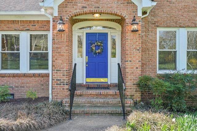 1403 Sneed Rd W, Franklin, TN 37069 - view of exterior entry featuring a shingled roof and brick siding