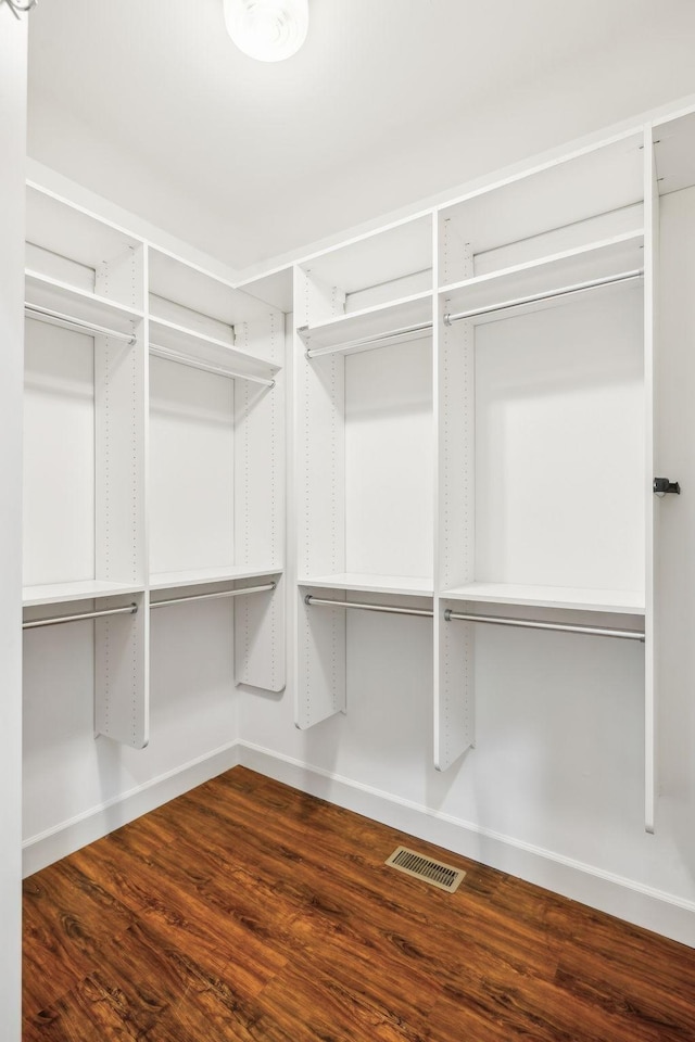 1403 Sneed Rd W, Franklin, TN 37069 - walk in closet with visible vents and dark wood finished floors