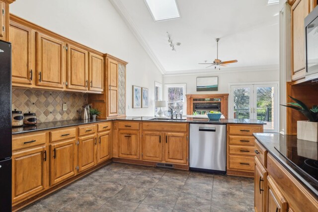 1403 Sneed Rd W, Franklin, TN 37069 - kitchen featuring backsplash, a healthy amount of sunlight, a sink, and black appliances