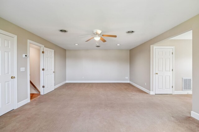 1403 Sneed Rd W, Franklin, TN 37069 - spare room with a ceiling fan, light colored carpet, visible vents, and baseboards