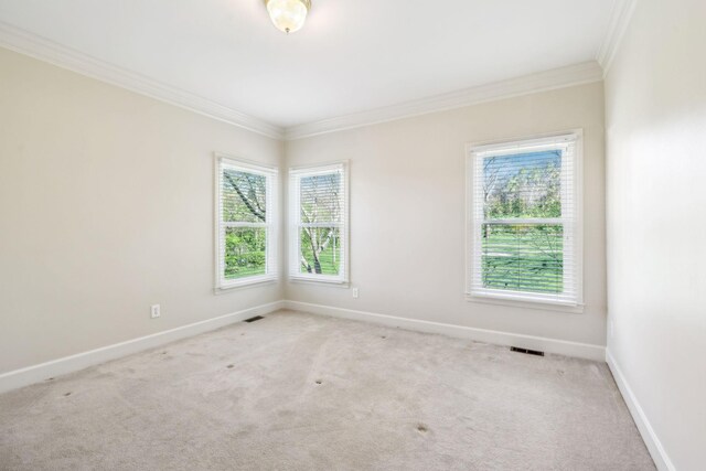 1403 Sneed Rd W, Franklin, TN 37069 - carpeted empty room featuring visible vents, ornamental molding, and baseboards