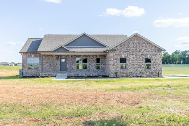 5367 Roy Holman Rd, Springfield, TN 37172 - craftsman-style home featuring brick siding, a front lawn, and a porch