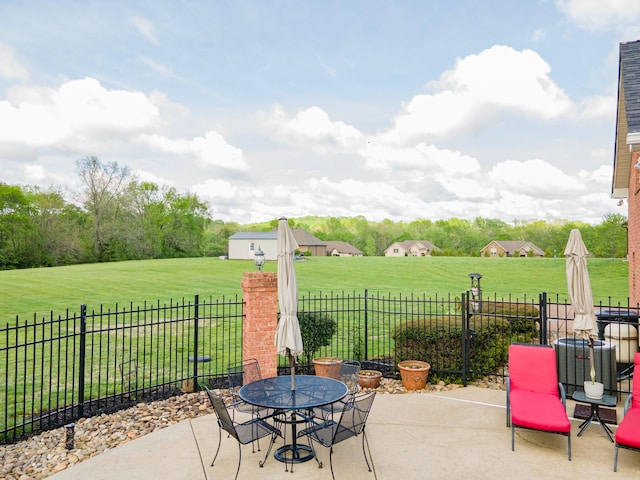 view of patio / terrace featuring outdoor dining area and fence