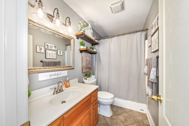 bathroom with visible vents, tile patterned flooring, vanity, curtained shower, and toilet