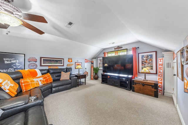 living area featuring a ceiling fan, visible vents, carpet floors, baseboards, and lofted ceiling
