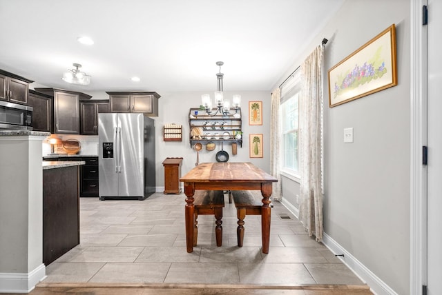 1804 Rains Rd, Clarksville, TN 37042 - dining space with baseboards, a notable chandelier, recessed lighting, and visible vents