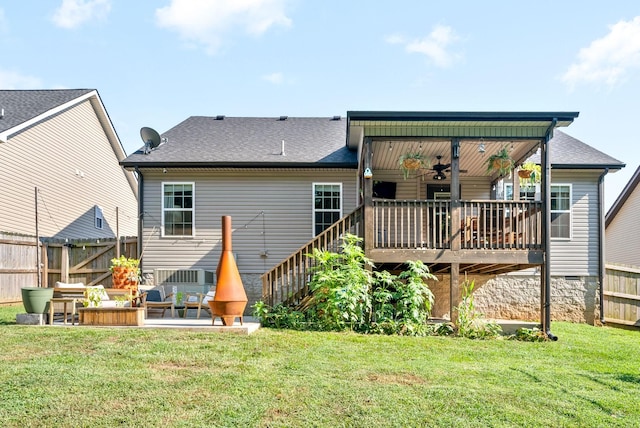 1804 Rains Rd, Clarksville, TN 37042 - back of property featuring a yard, fence, a ceiling fan, and roof with shingles