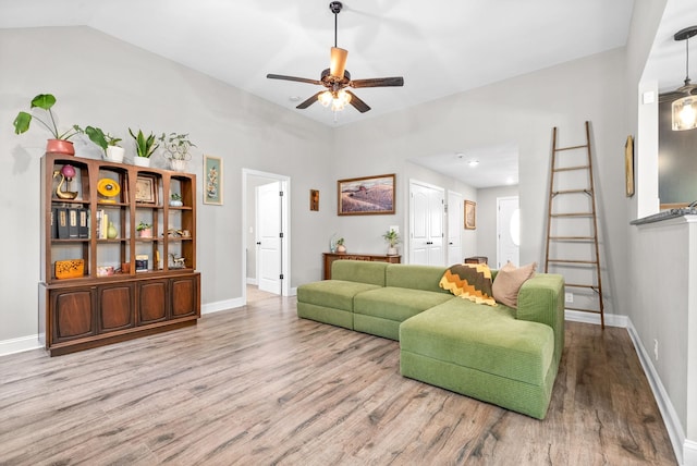 1804 Rains Rd, Clarksville, TN 37042 - living room with baseboards, a ceiling fan, and wood finished floors