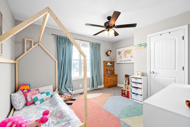 1804 Rains Rd, Clarksville, TN 37042 - bedroom with baseboards, ceiling fan, and light carpet