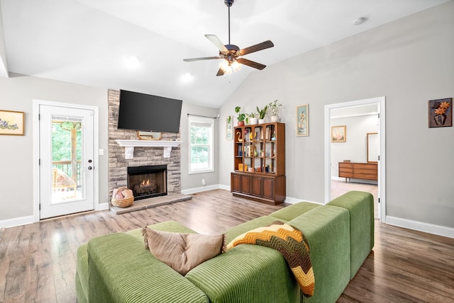 1804 Rains Rd, Clarksville, TN 37042 - living room featuring a ceiling fan, lofted ceiling, wood finished floors, and a fireplace