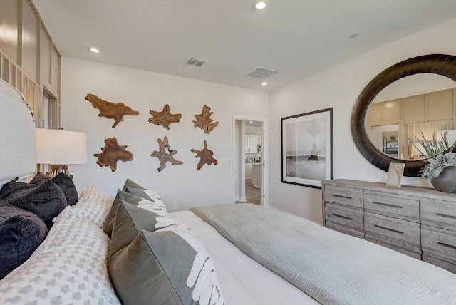 bedroom featuring recessed lighting and visible vents